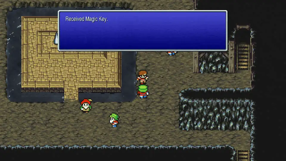 The green-hatted dwarf next to the horns, ready to hand over the Magic Key
